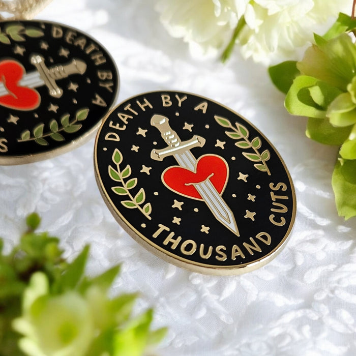 Death By A Thousand Cuts Enamel Pin