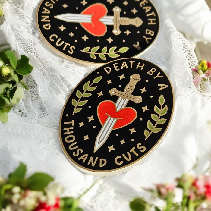 Death By A Thousand Cuts Enamel Pin