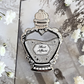 Illicit Affairs Perfume Enamel Pin