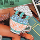 Storm In A Teacup Enamel Pin